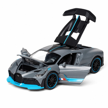 Машинка Bugatti Divo XA3217 1:32 cерый (6972512140823) Машинка Bugatti Divo XA3217 1:32 cерый (6972512140823)